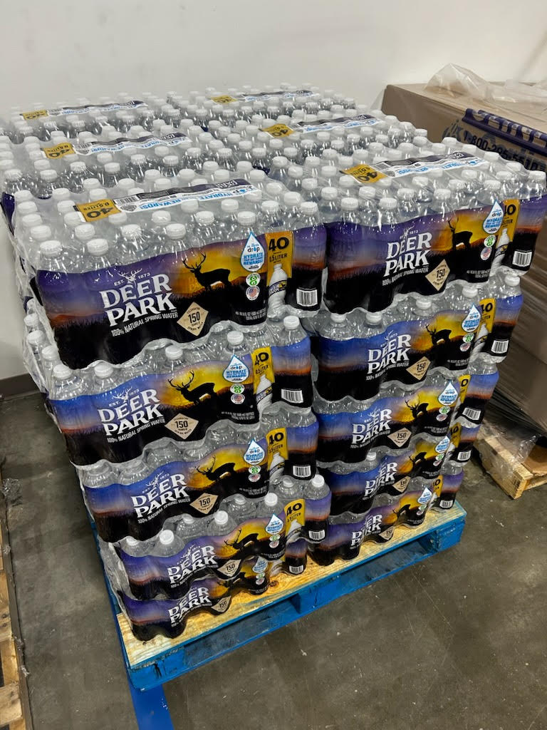 BPA-free Deer Park bottled water on full pallet—1,920 bottles of Appalachian-sourced spring hydration.
