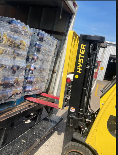 Deer Park natural spring water—48-case pallet stacked for business, event, or warehouse water supply.