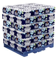 Full pallet of Deer Park 16.9 oz spring water bottles shrink-wrapped for freight shipping and bulk hydration.